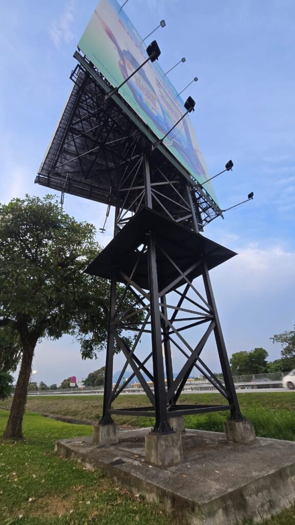 Roadside pole signage installation for outdoor advertising